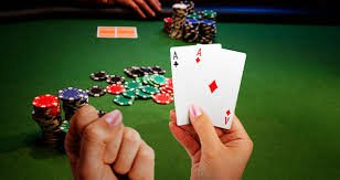 Antarmuka permainan BandarQ di platform bet9ja dengan meja dan kartu domino